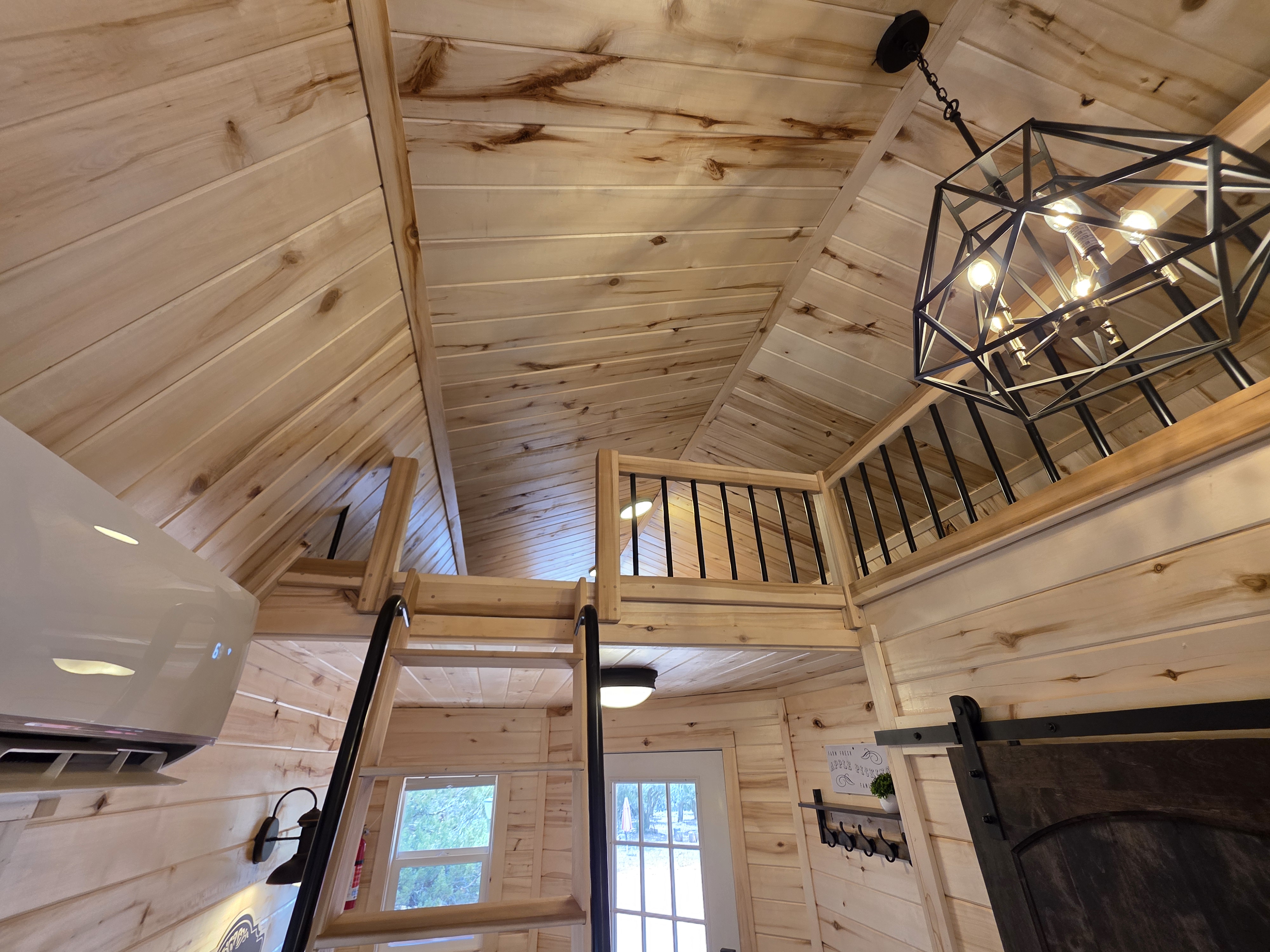 Second floor queen bed ladder view Apple Blossom Cabin